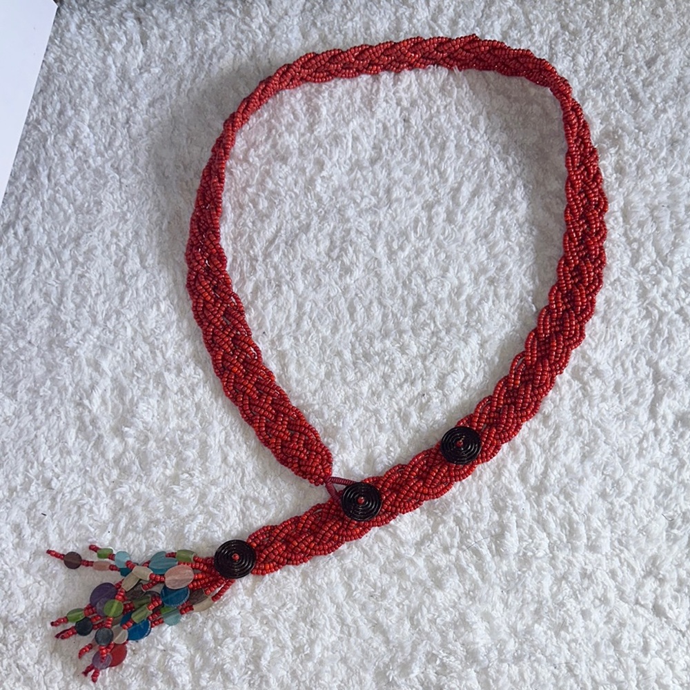 Red and Brown Braided Belts with Artisanal Charm